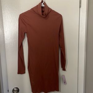 Long sleeve turtle neck dress from Target, size medium brown and never worn